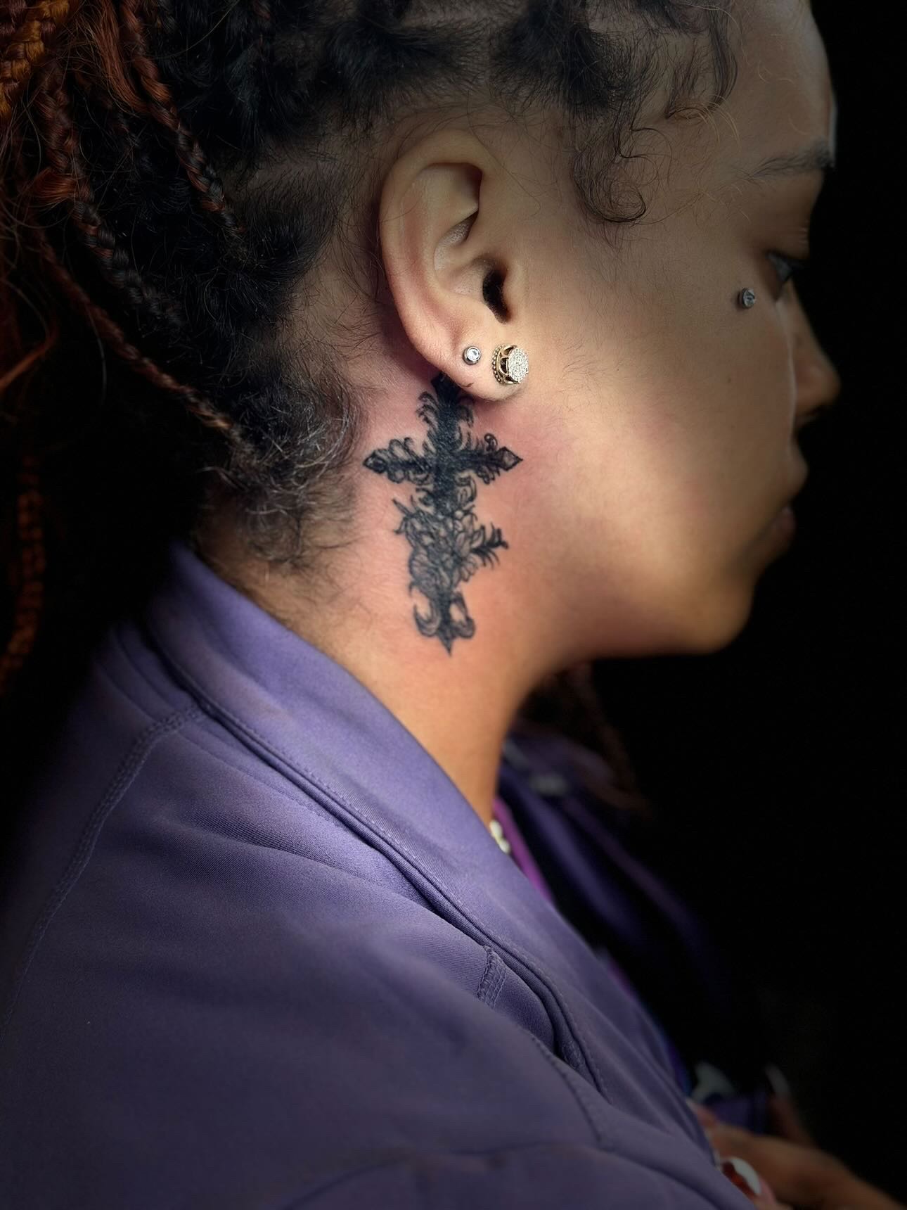 Ornate cross neck tattoo